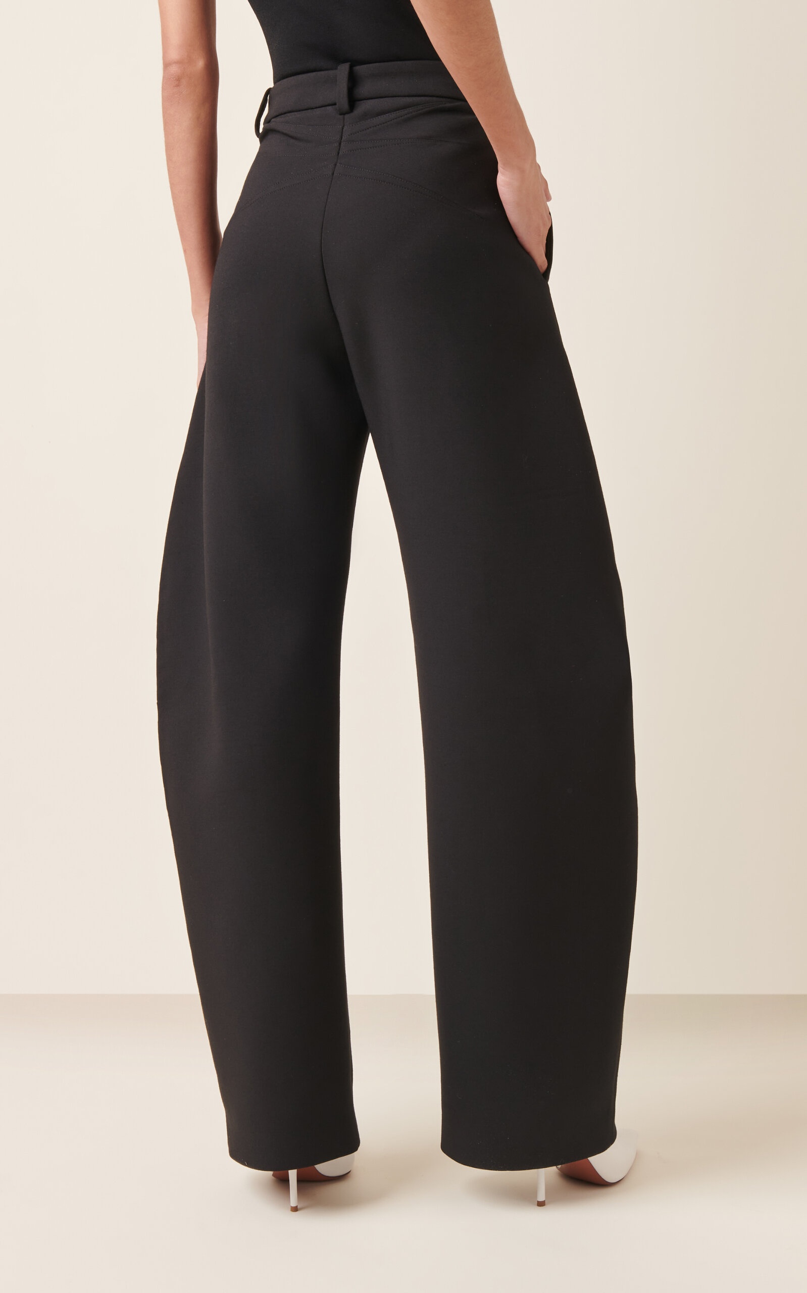 パンツ ALAIA WOOL BLEND CURVED-LEG PANTS Alaïa Rounded Wool Wide-Leg Pants black | modaoperandi