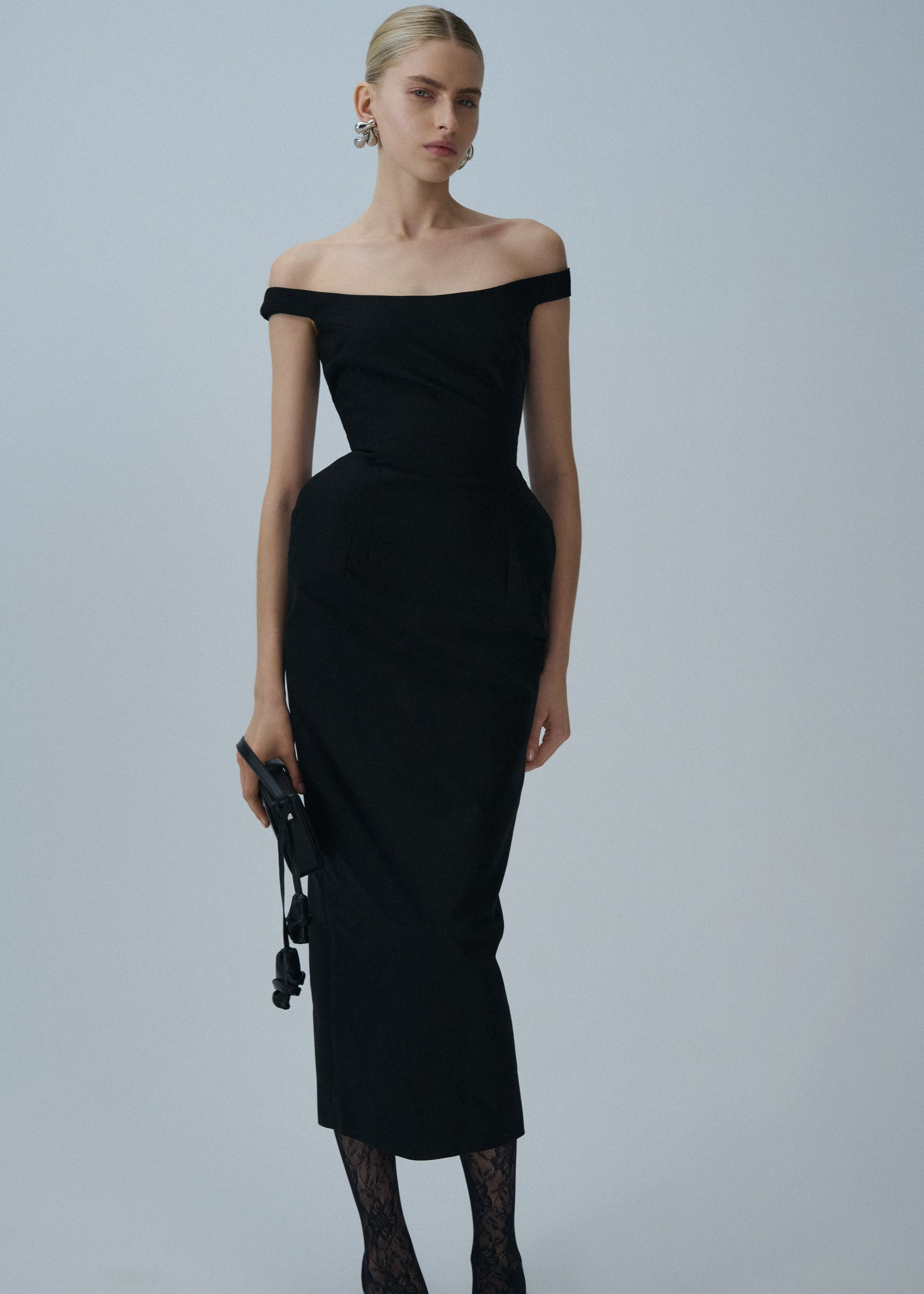 Off-shoulder hip pad midi dress in black - 3