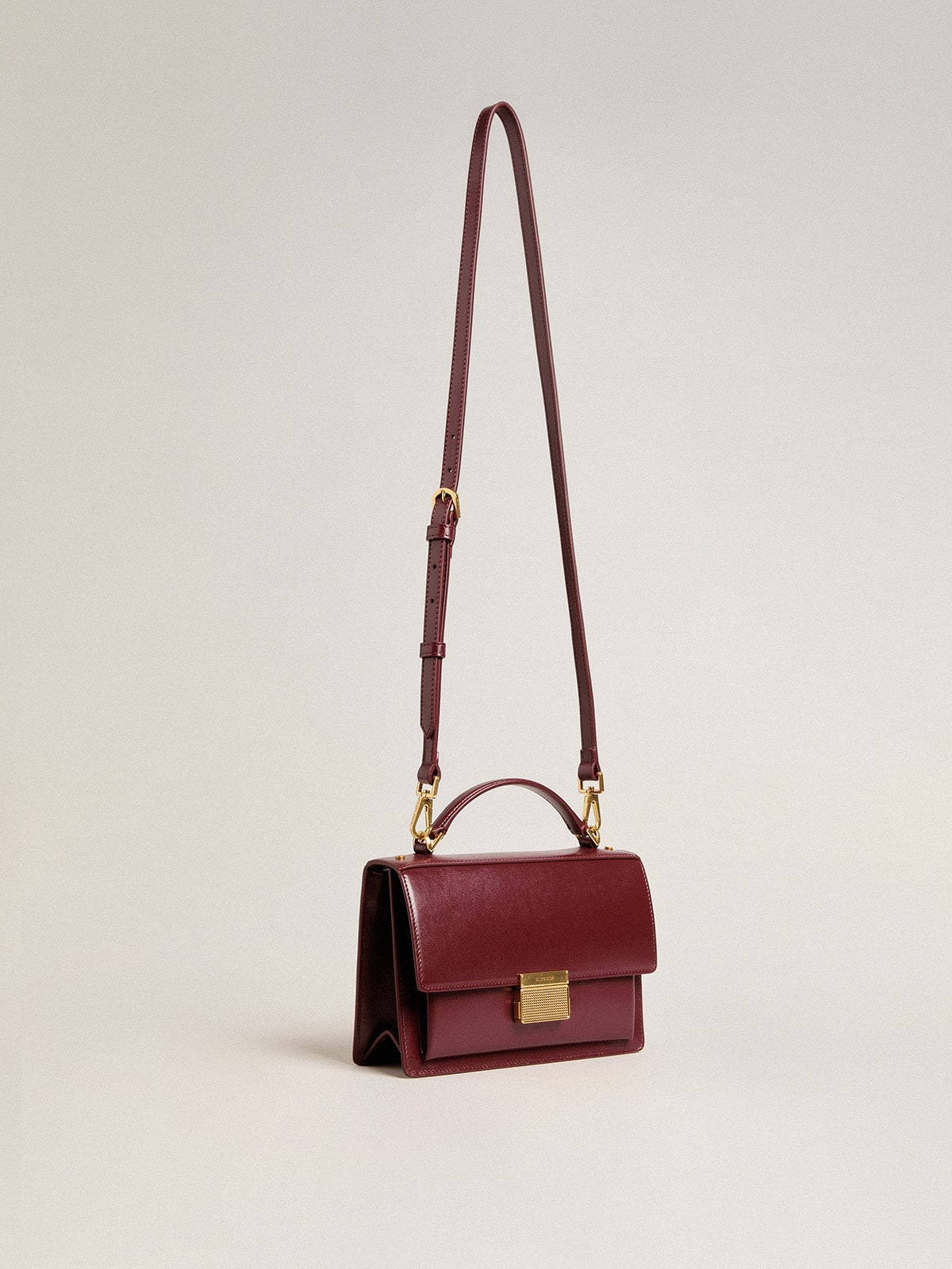 Venezia Bag in burgundy boarded leather with gold details - 2
