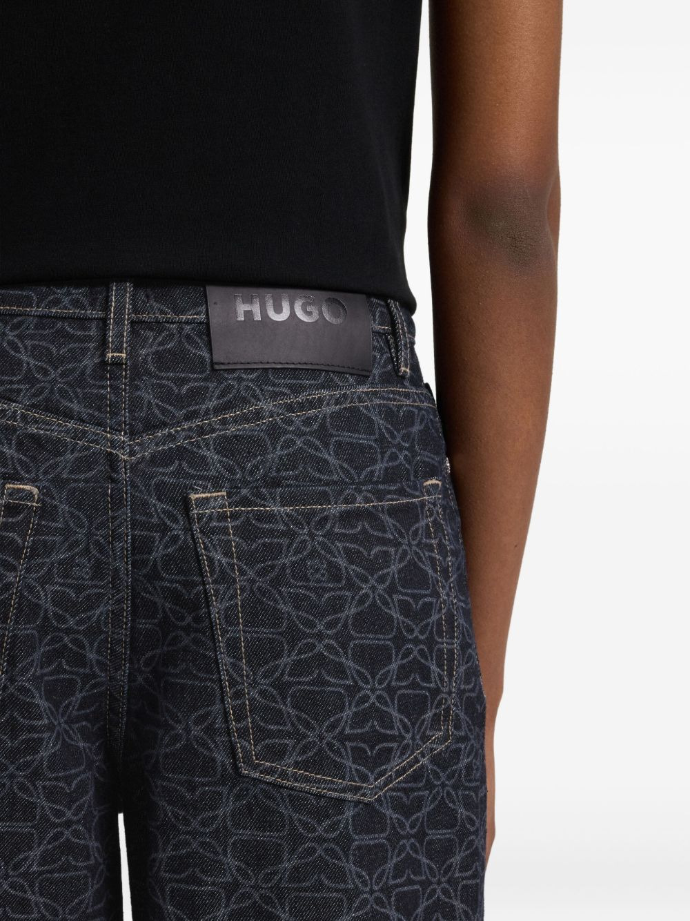 monogram-print jeans - 4