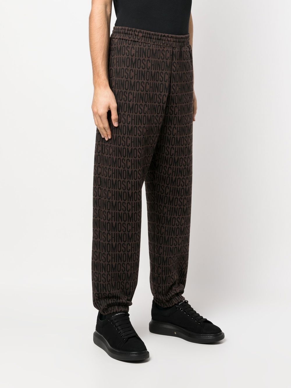 all-over embroidered logo track pants - 3