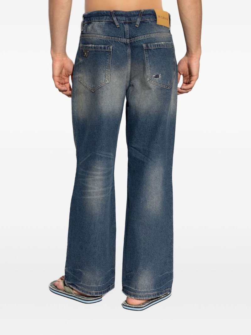 distressed-knee jeans 4