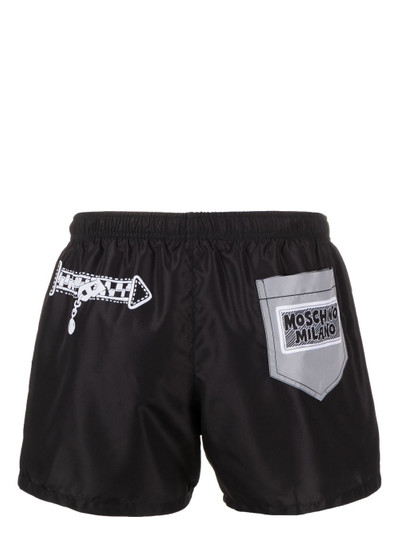 Moschino logo-print swim shorts outlook