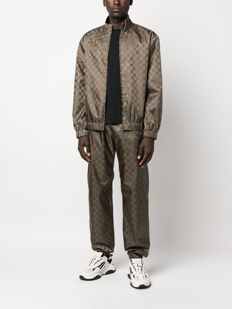 MISBHV monogram-pattern trackpants outlook