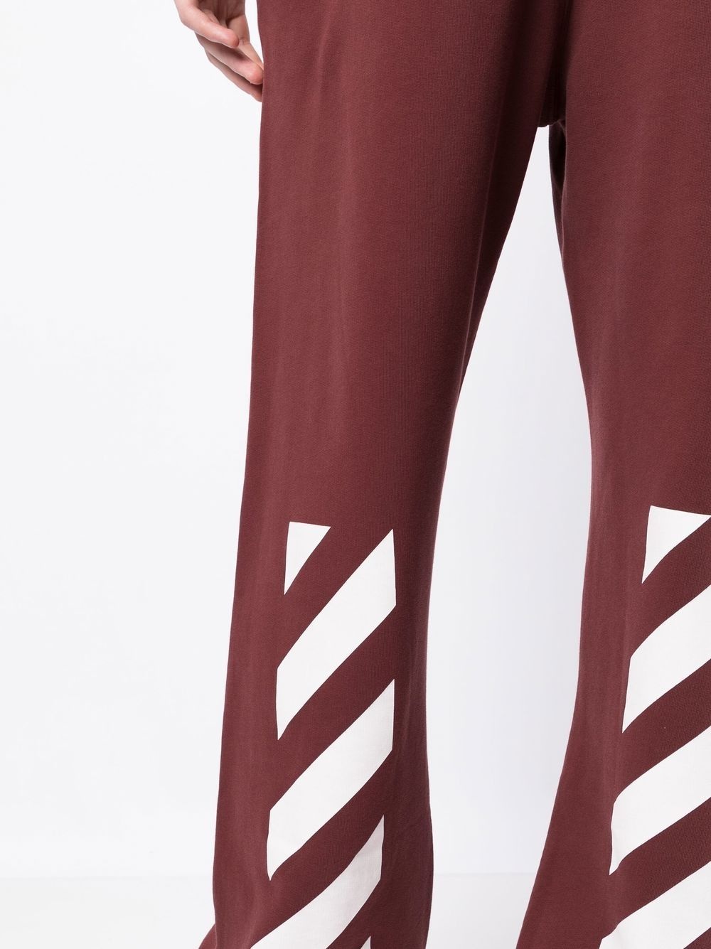 Arrows-print straight-leg track pants - 10