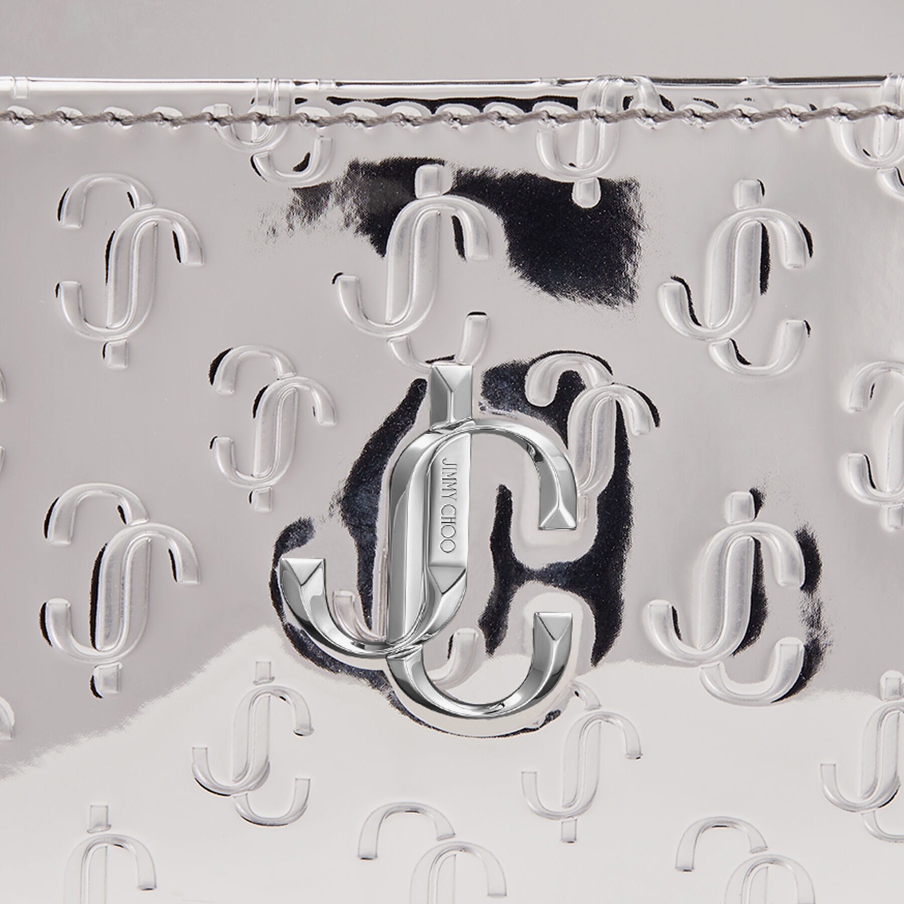 Umika
Silver Metallic Fabric and JC Mirror Fabric Card Holder - 3