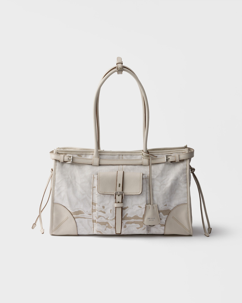 Prada Bonnie large printed linen and leather handbag 1