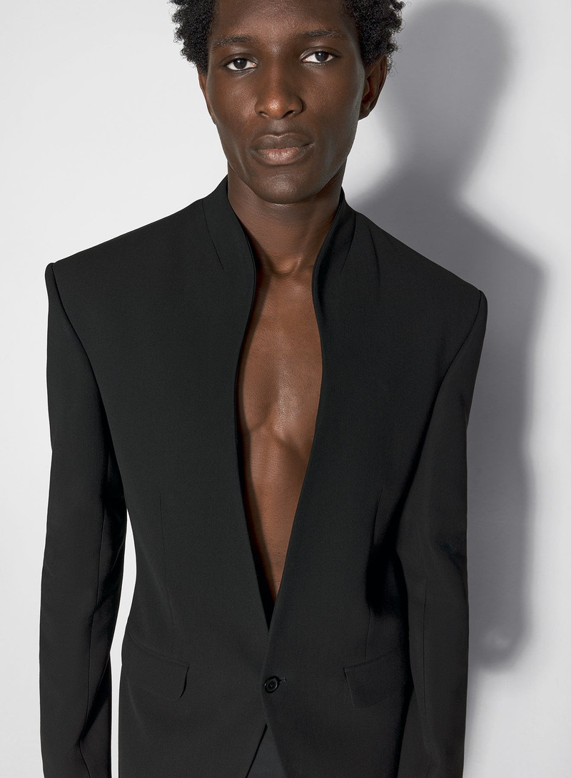 black collarless tailored jacket 1