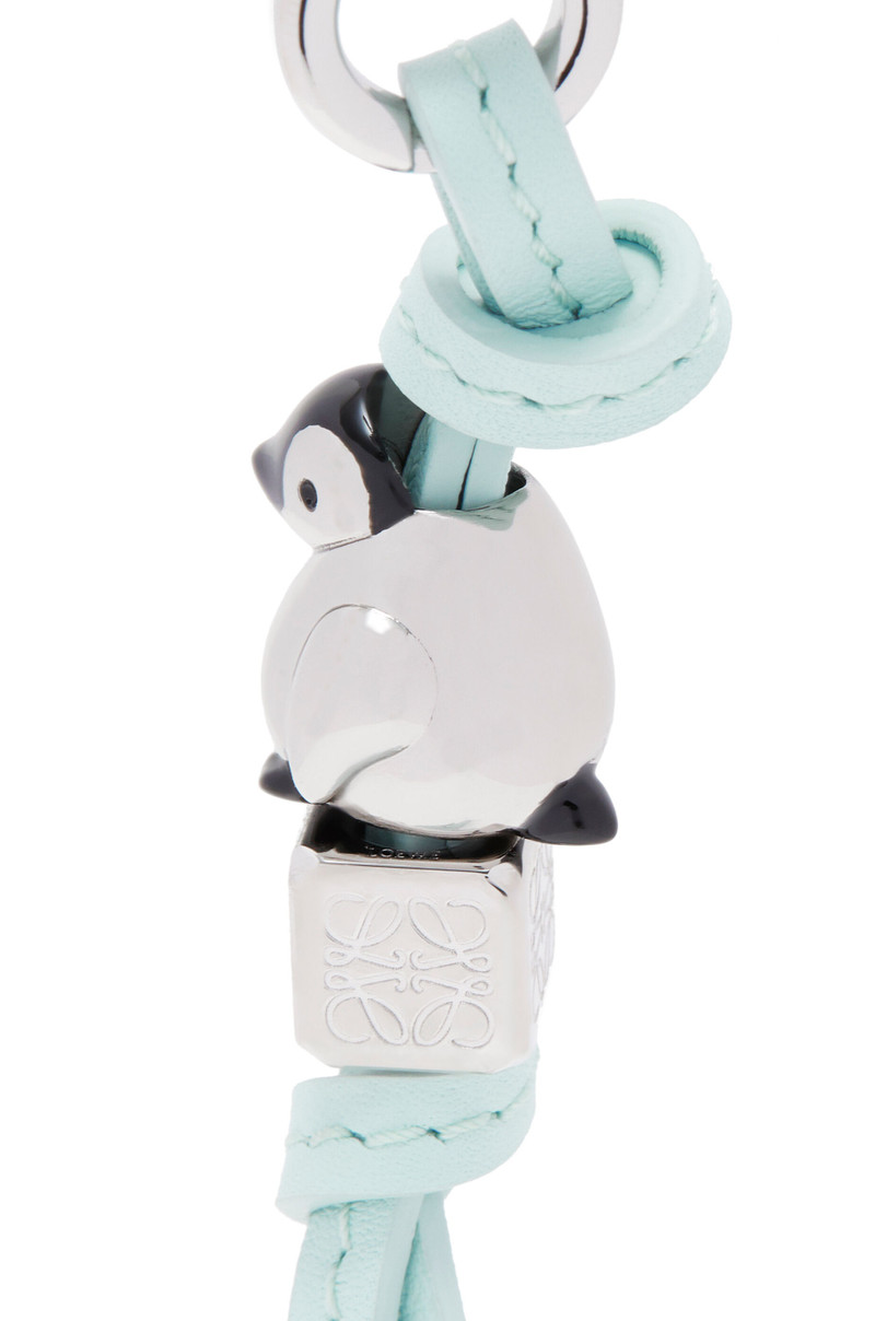 Loewe Penguin dice charm in calfskin and brass outlook