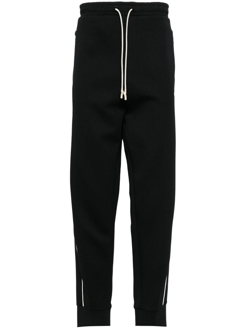 logo-embossed track pants 1