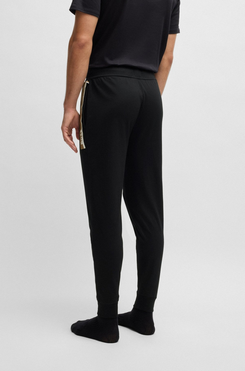 COTTON-TERRY TRACKSUIT BOTTOMS WITH STRIPE PRINT 4