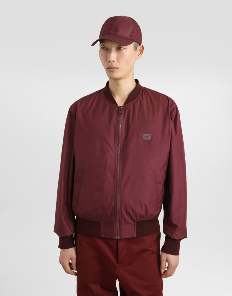 Technical fabric bomber jacket with tag 2