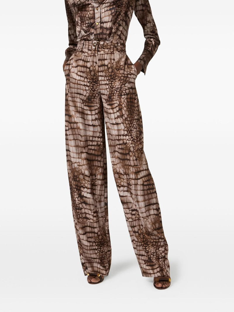 alligator-print buttoned trousers 4