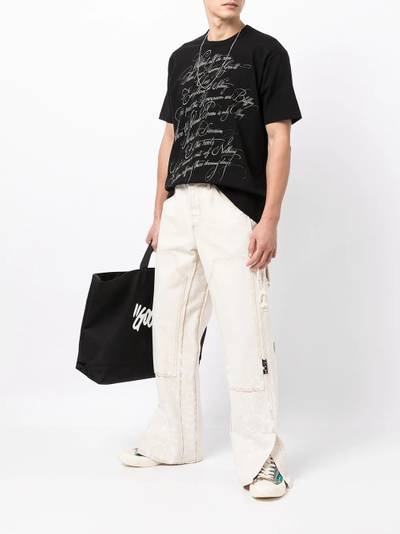 Junya Watanabe MAN slogan-print cotton T-shirt outlook