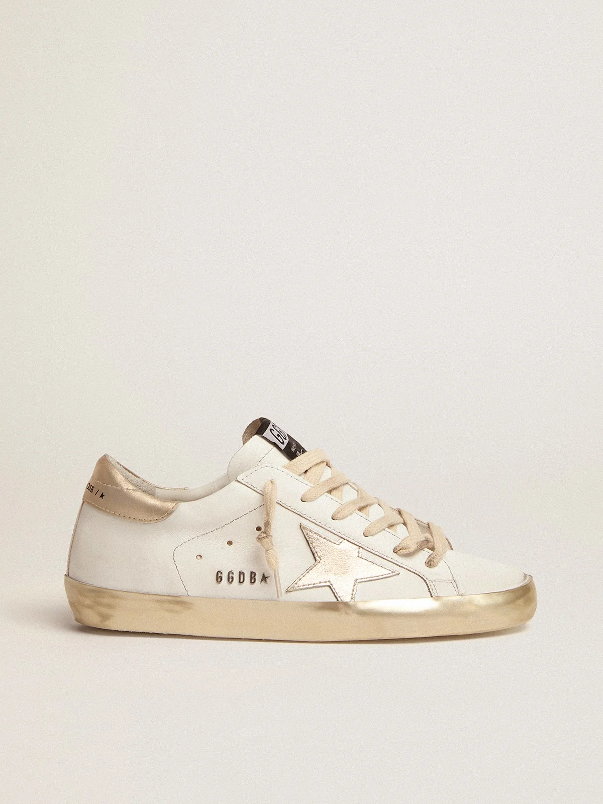 Golden Goose Women's Super-Star sneakers with gold sparkle foxing