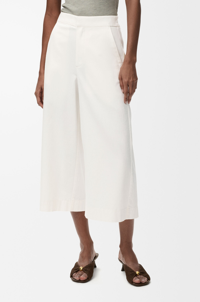 Cropped trousers in denim 3