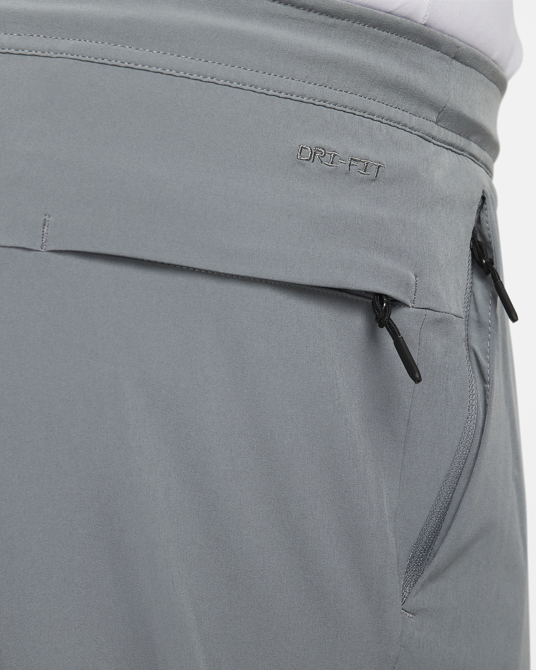 Nike Unlimited Men's Dri-FIT Zippered Cuff Versatile Pants - 11