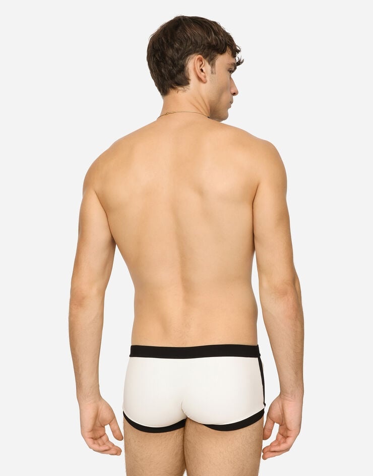 High-legged swim trunks with patch - 5