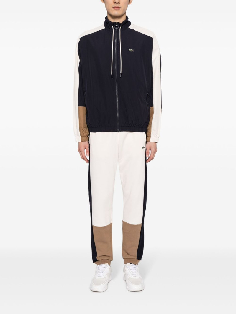 LACOSTE logo-embroidered colour-block track pants outlook