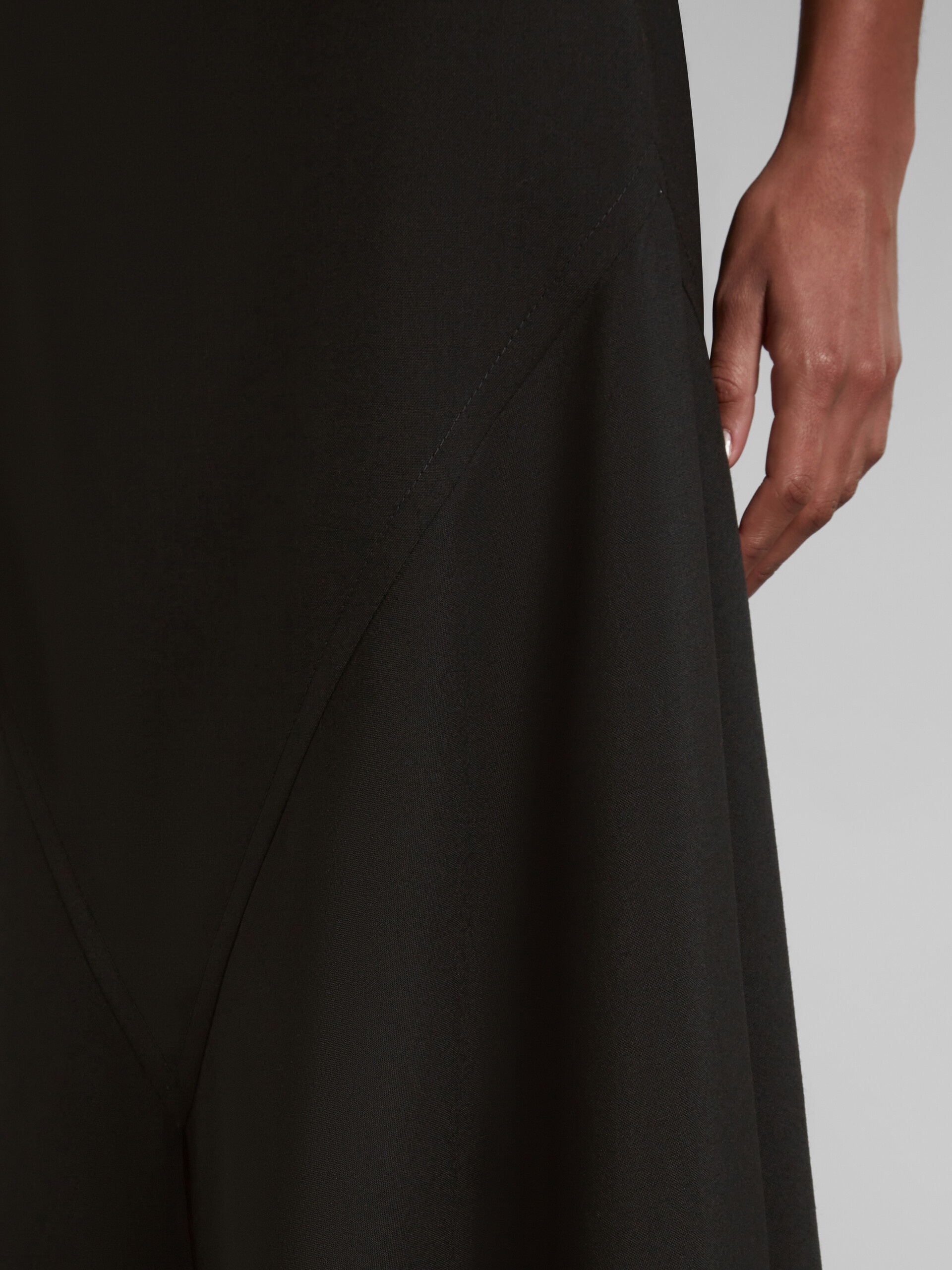 BLACK WOOL SKIRT WITH ASYMMETRIC HEM - 4