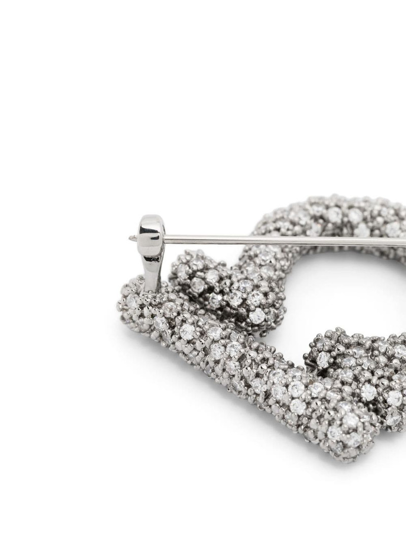 Jil Sander omega-shaped brooch outlook