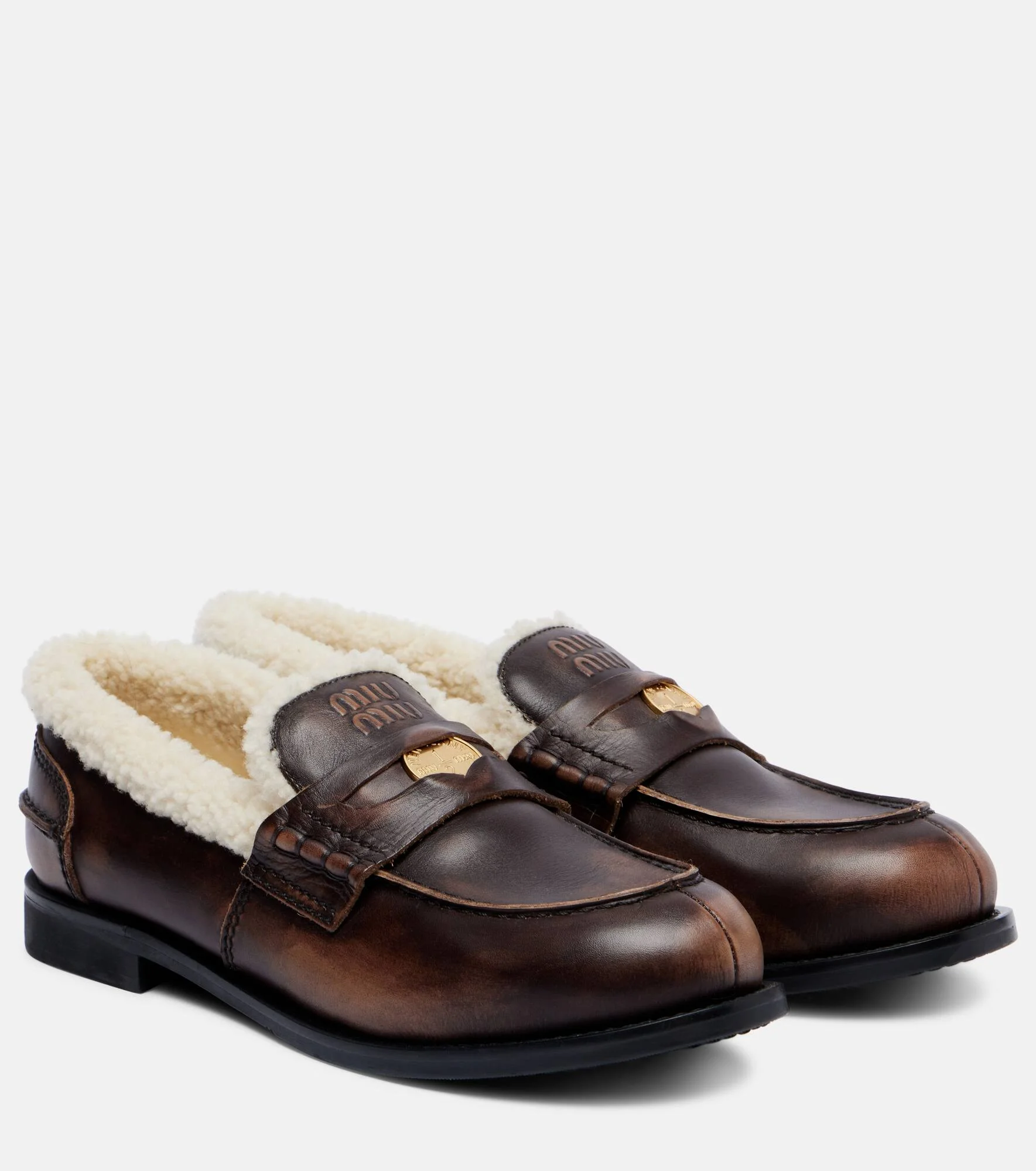 Shearling-lined leather penny loafers - 1