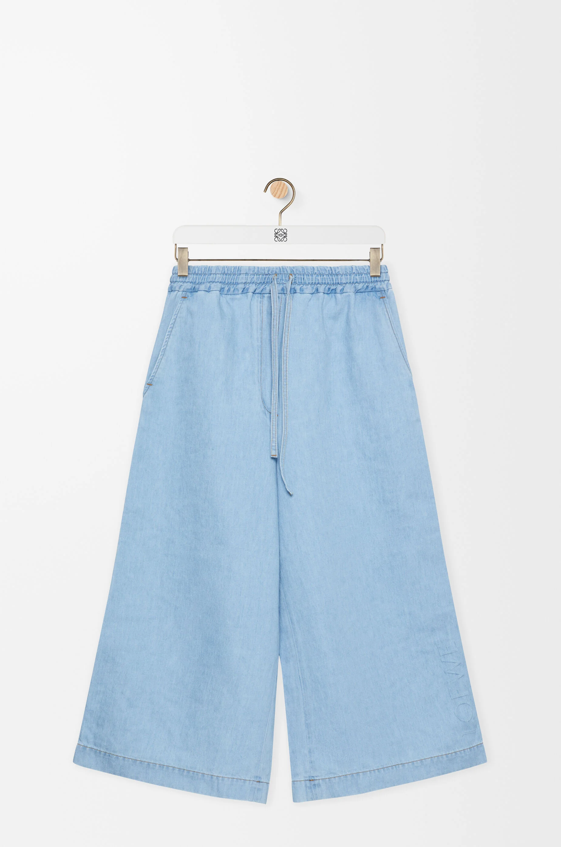 Cropped trousers in denim - 1