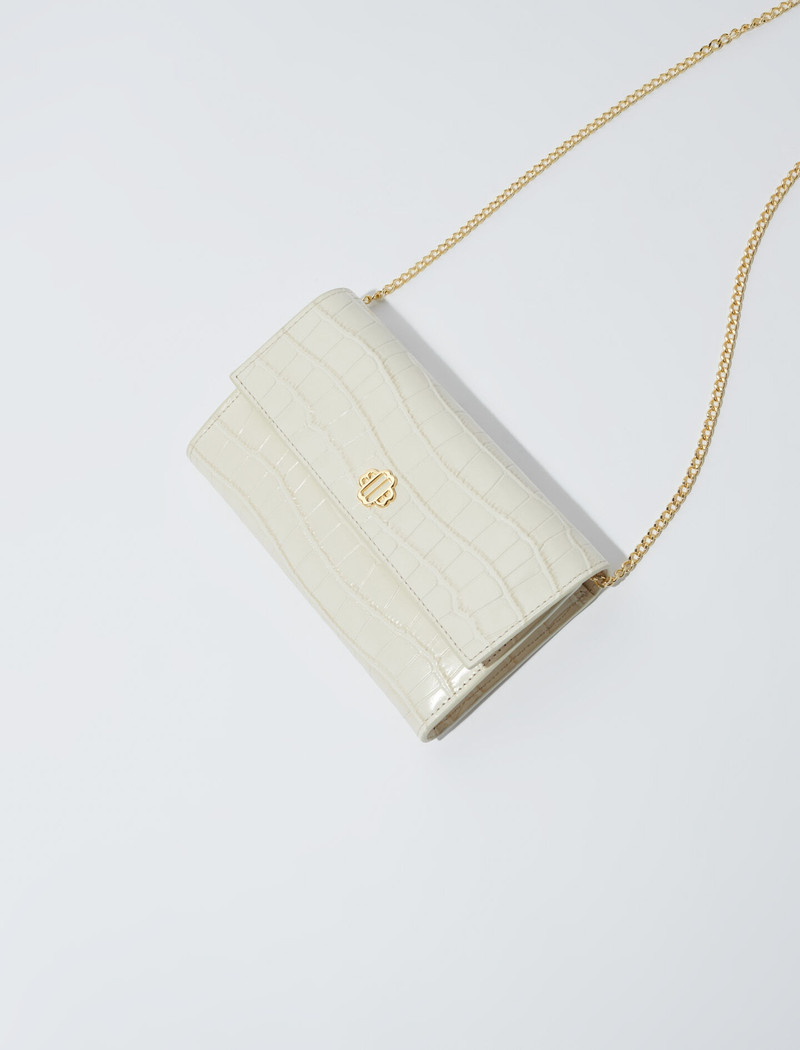 Croc-effect embossed leather bag 5