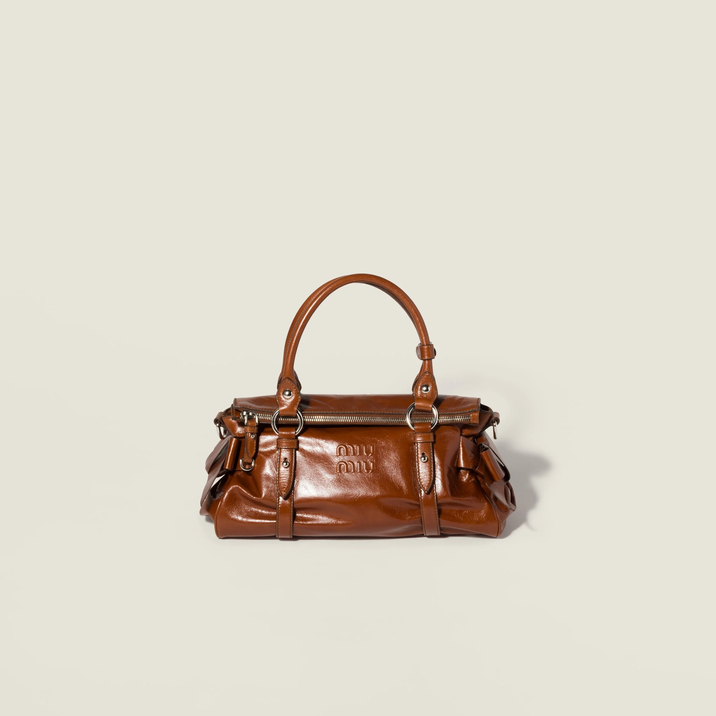Shiny leather handbag - 1