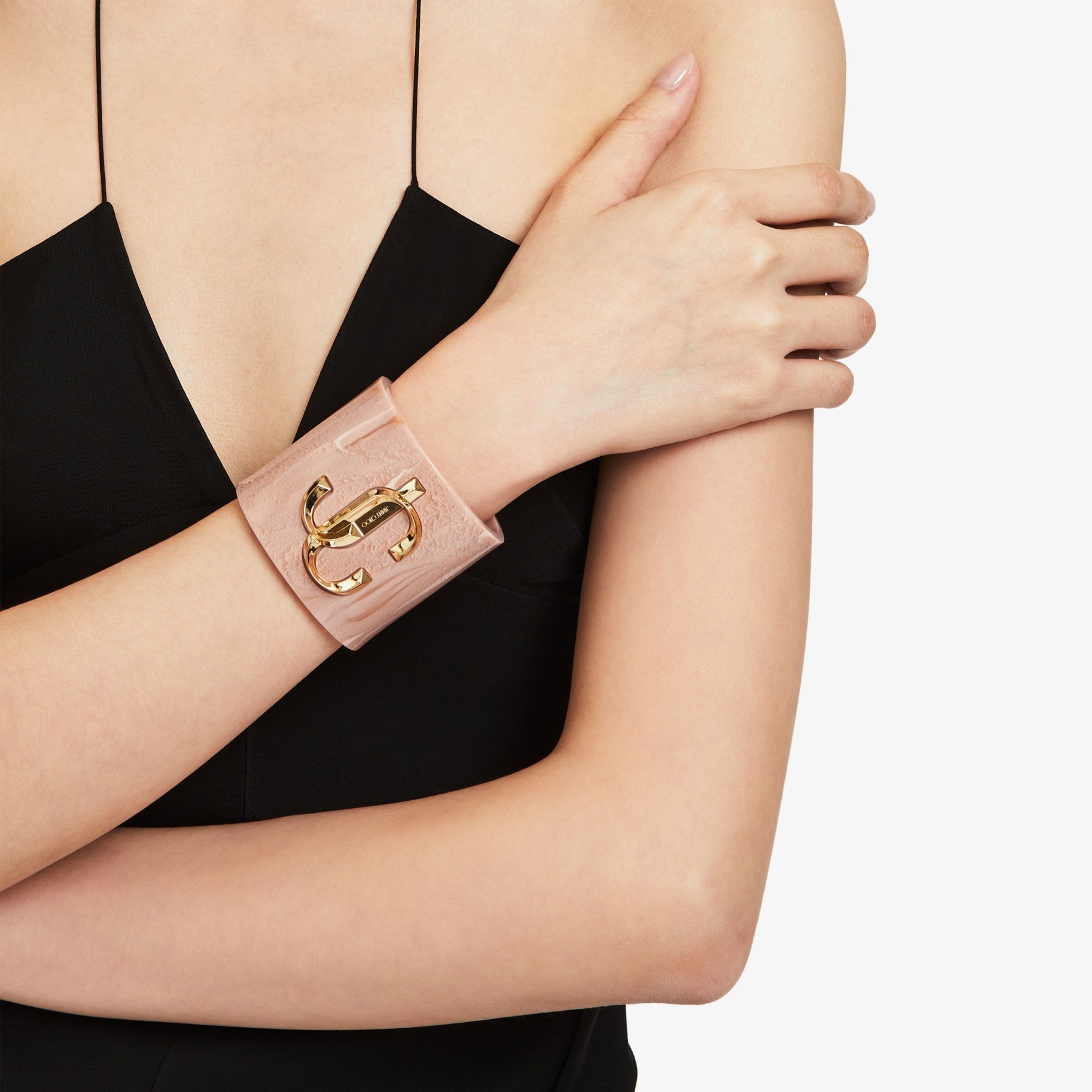 JC Cuff
Ballet Pink Acrylic Cuff Bracelet with Gold-Finish Metal JC Emblem - 2