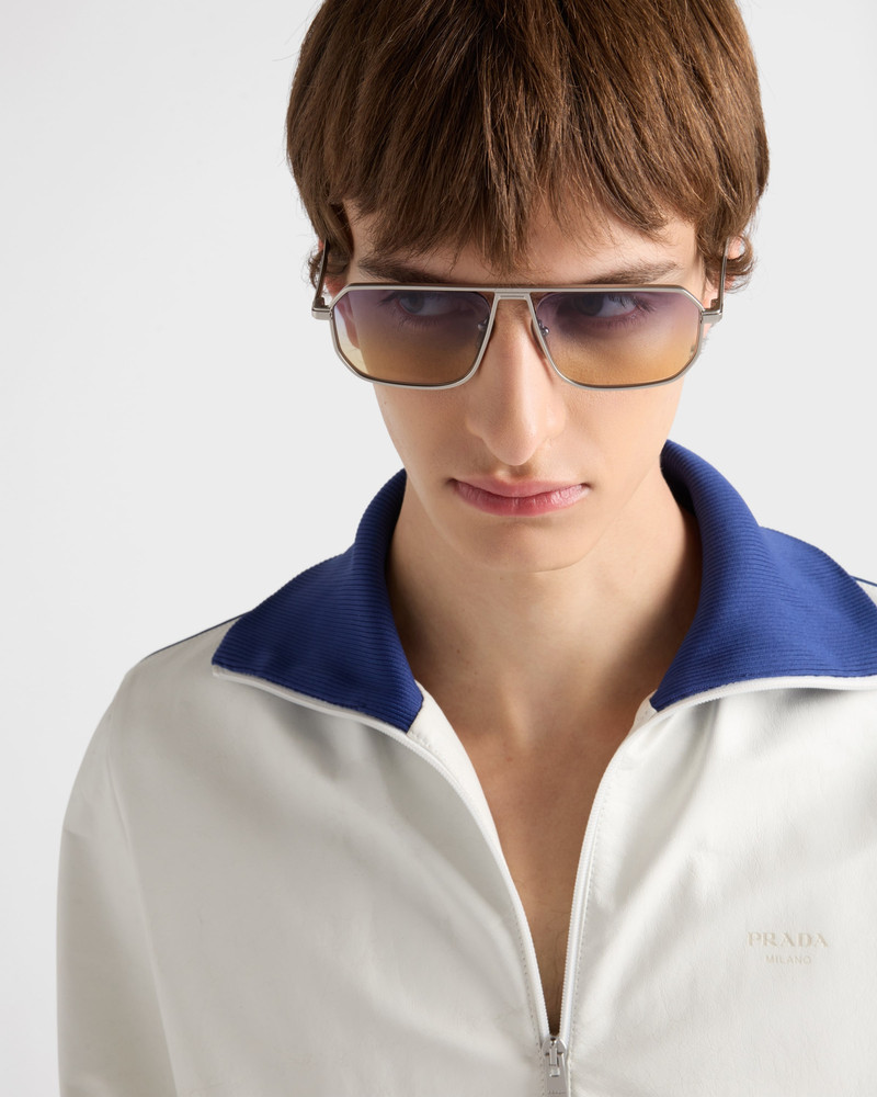 Prada Sunglasses with the iconic metal plaque outlook