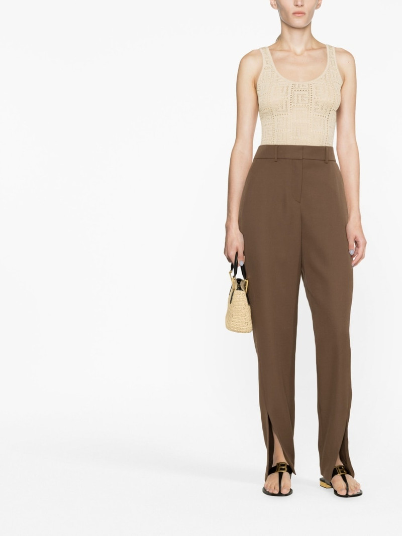 Balmain slit-detail wool tapered trousers outlook