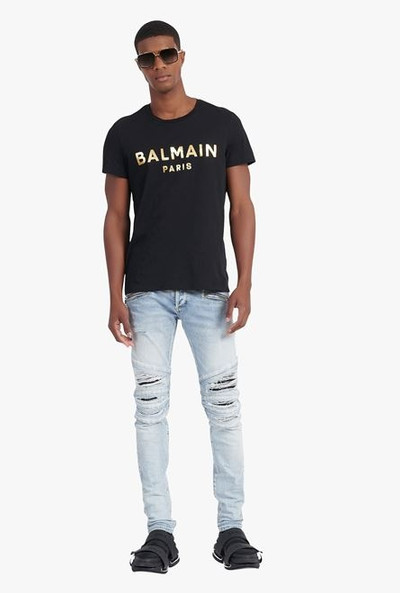 Balmain Slim cut ripped light blue cotton jeans with synthetic leather panels outlook