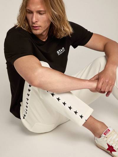Golden Goose Men's black T-shirt with contrasting white logo and star outlook