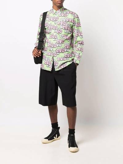 Comme des Garçons SHIRT Kaws-print cotton shirt outlook