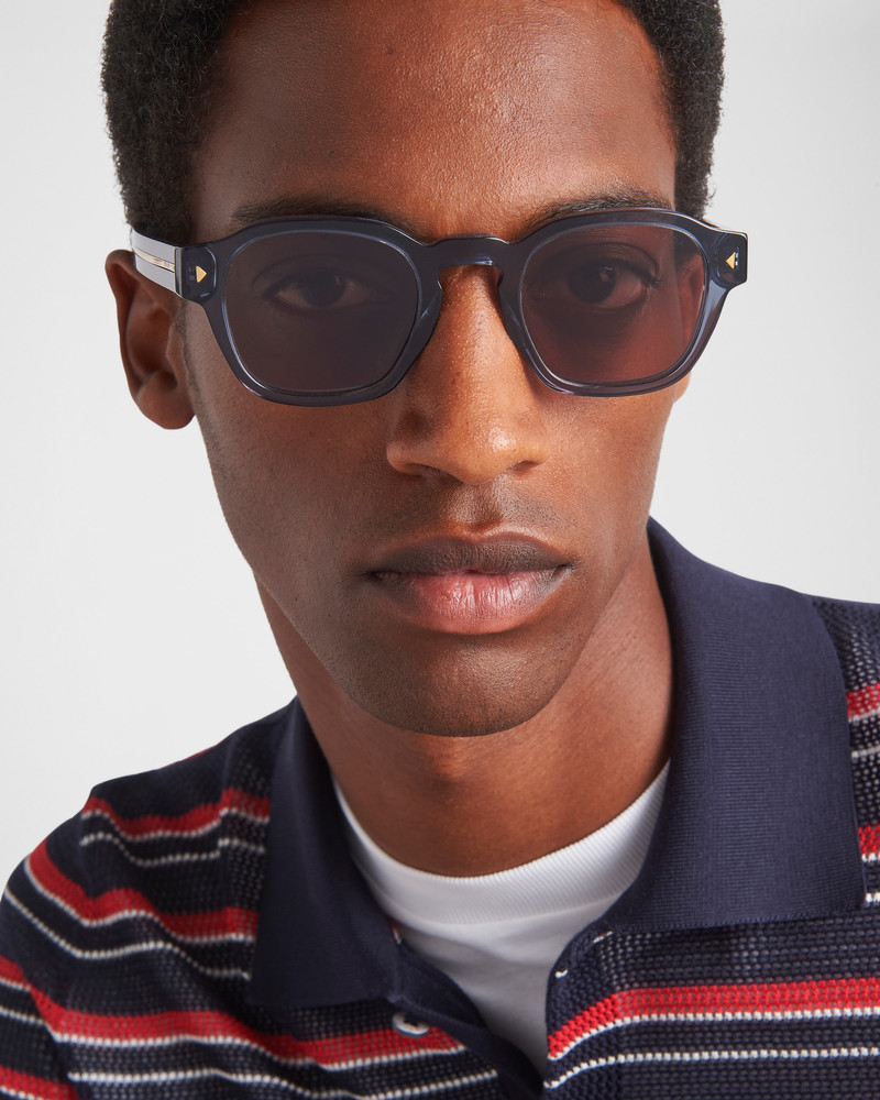 Prada Sunglasses with iconic metal plaque outlook