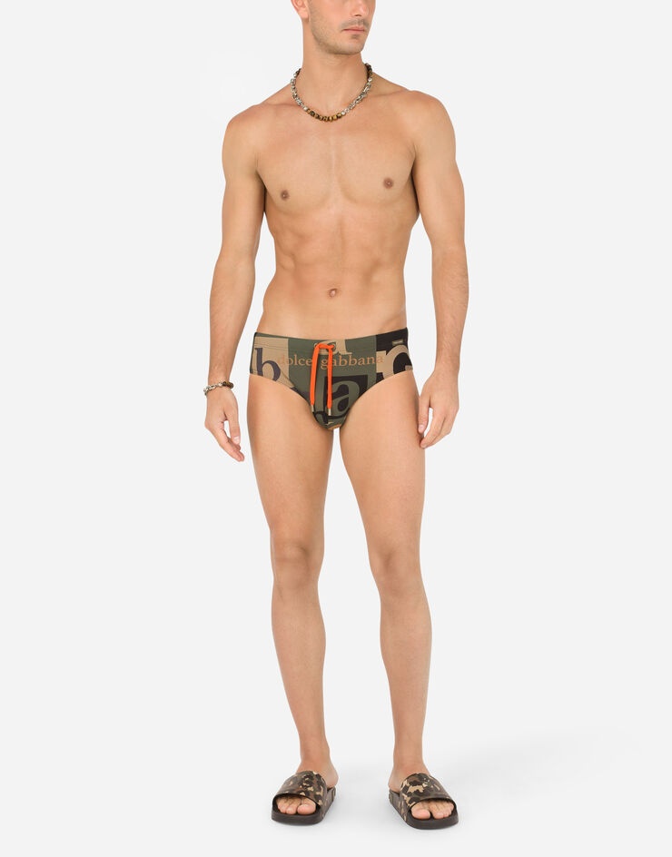 Swim briefs with all-over logo print - 2