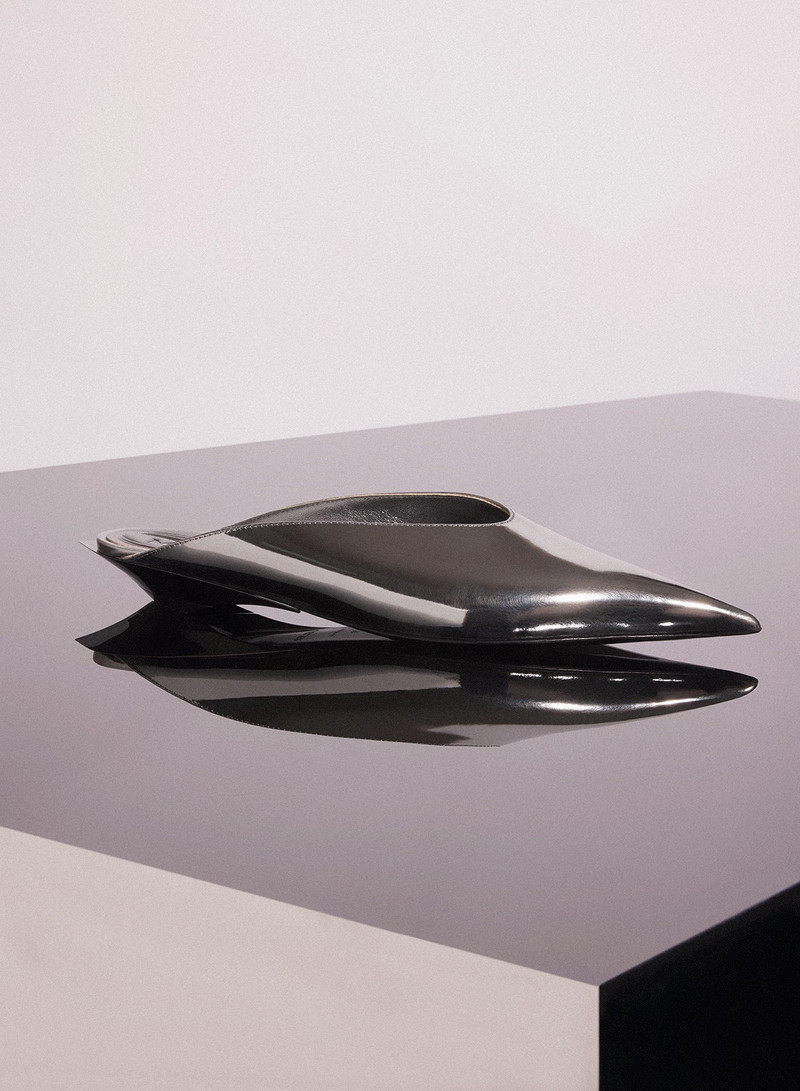 gunmetal leather fang flat mules 1