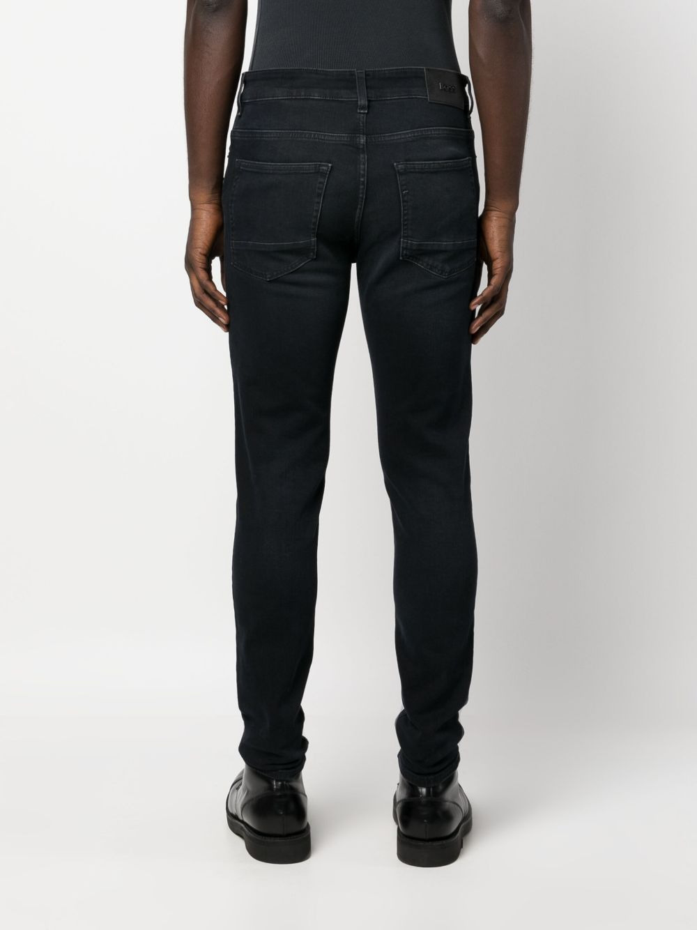 mid-rise tapered-leg jeans - 4