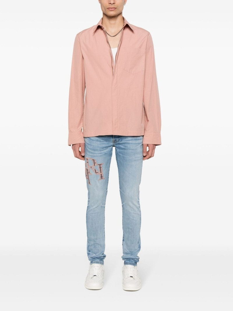 AMIRI logo-embroidered skinny jeans outlook