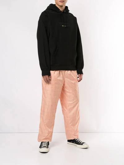 Supreme logo grid tapered trousers outlook