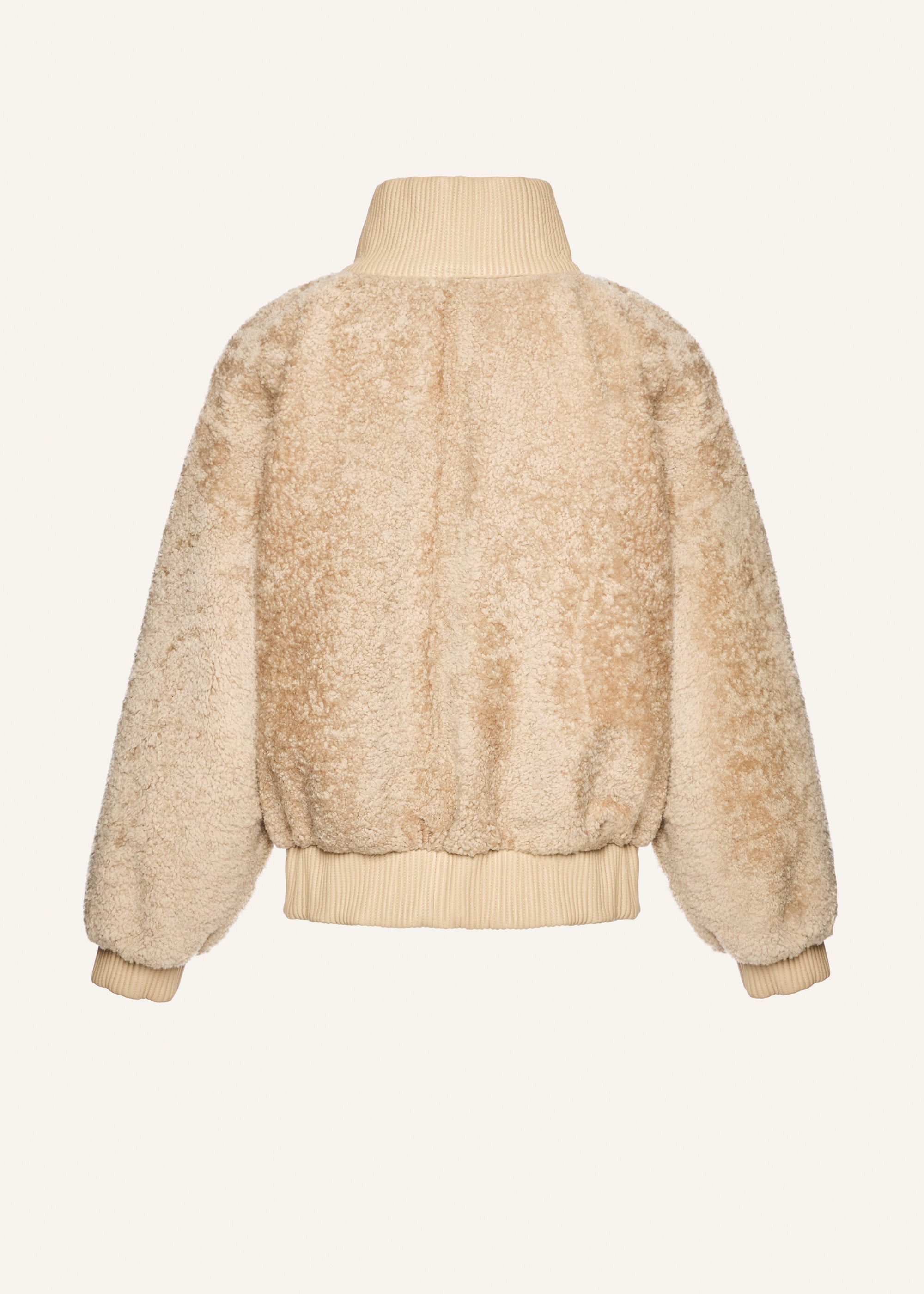 Leather-trimmed shearling bomber jacket in beige - 2