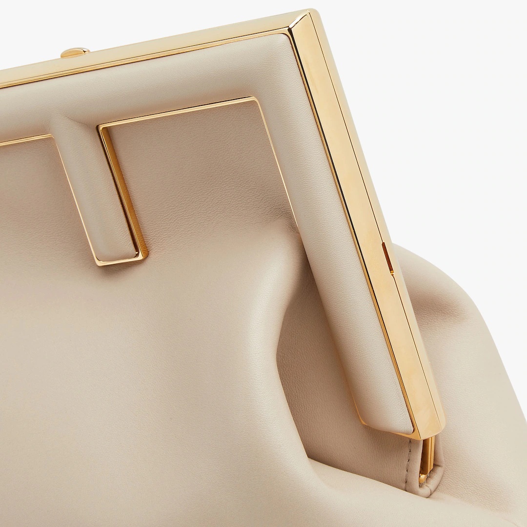 Medium Fendi First bag made of soft, beige nappa leather with oversized metal F clasp bound in tone  - 5