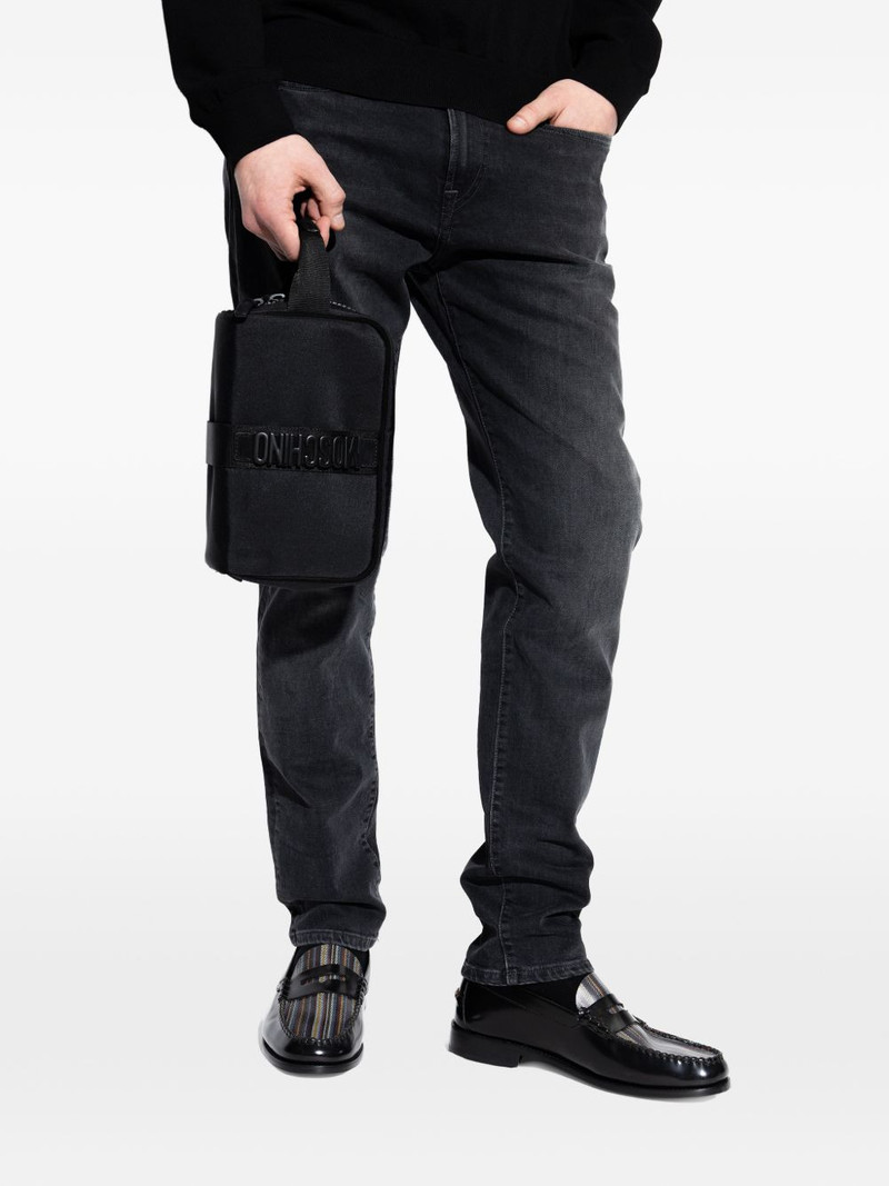 Moschino logo zip clutch bag outlook