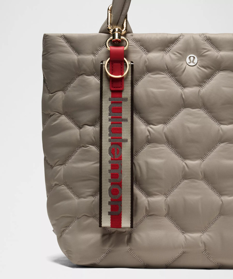 lululemon Never Lost Keychain *Wordmark outlook