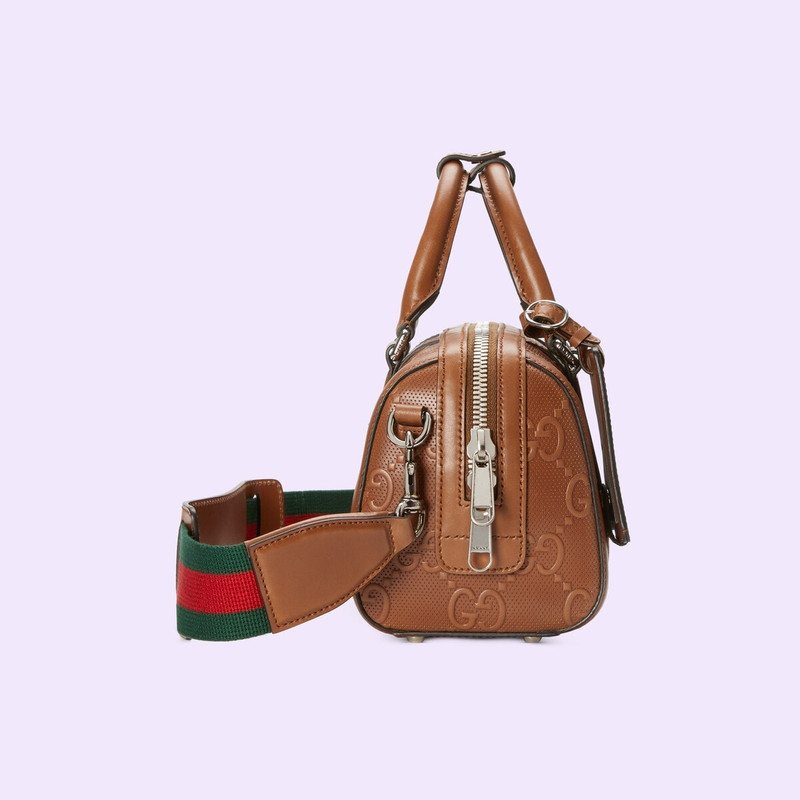 GG embossed mini duffle bag 7
