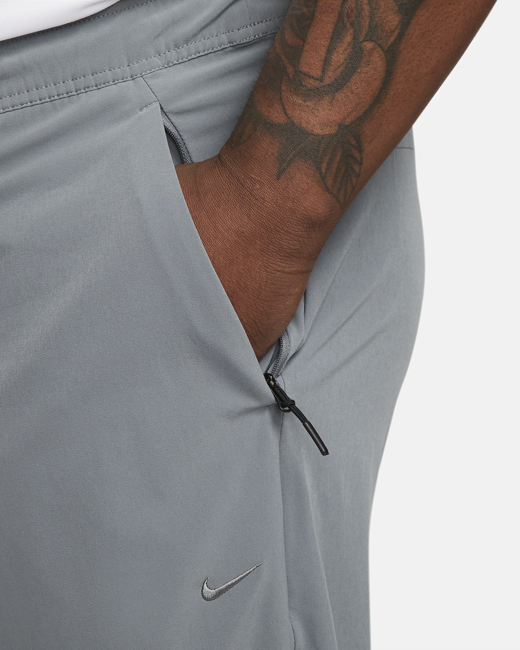 Nike Unlimited Men's Dri-FIT Zippered Cuff Versatile Pants - 9