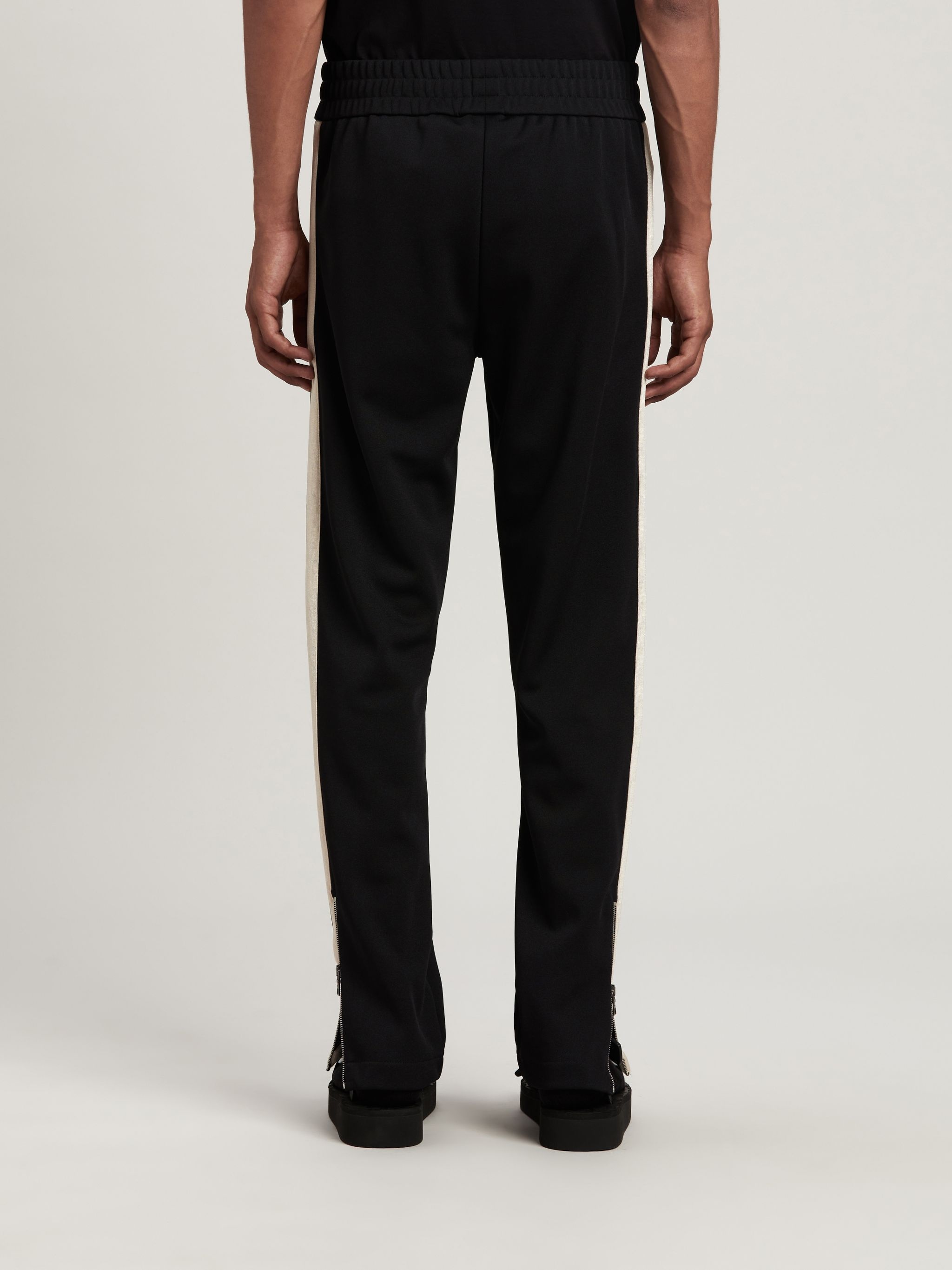 【関税＆送料込み】Palm Angels \"Logo Tape\" Knitted Trousers 23074275_54064147_1000.jpg
