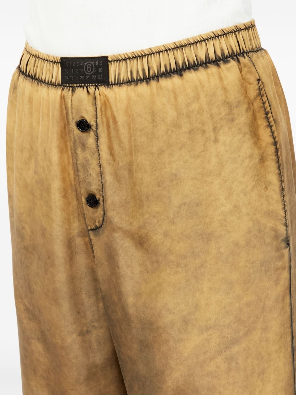 distressed-finish flared trousers - 7