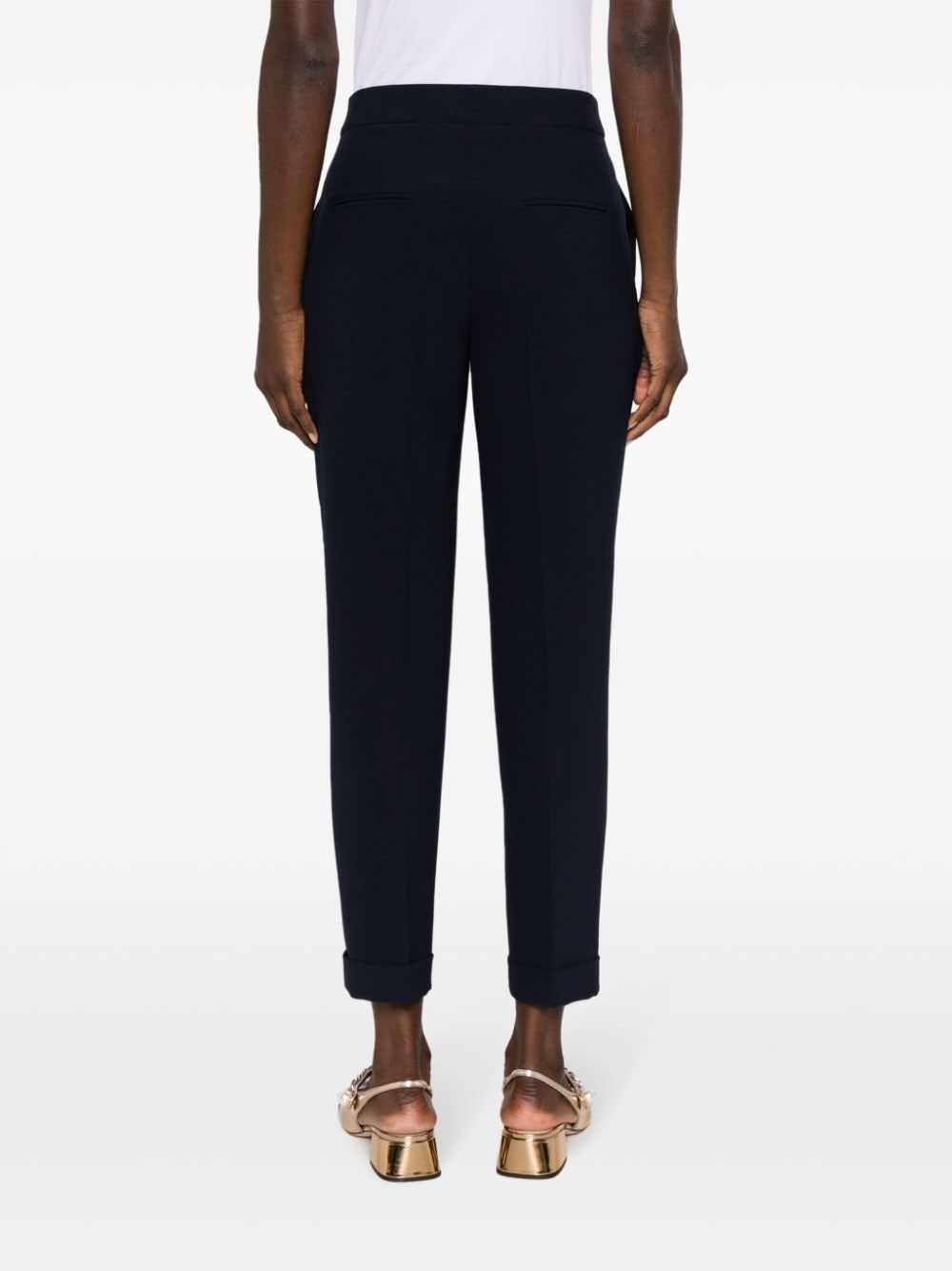 pressed-crease concealed-fastening tapered trousers - 4